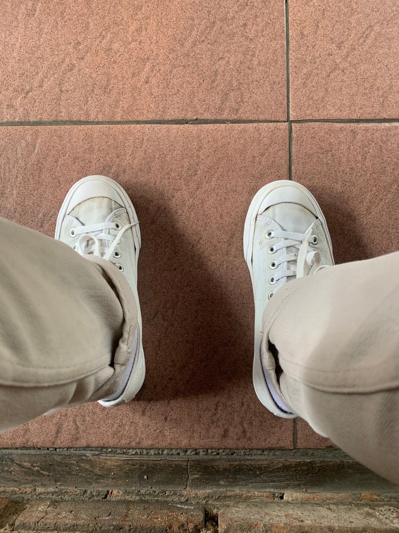 Everyday sneakers on a city street